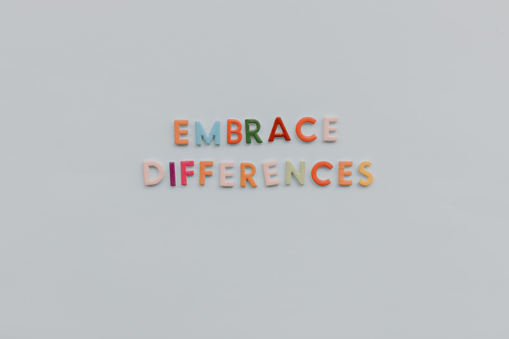 Colorful letters spelling Embrace Differences