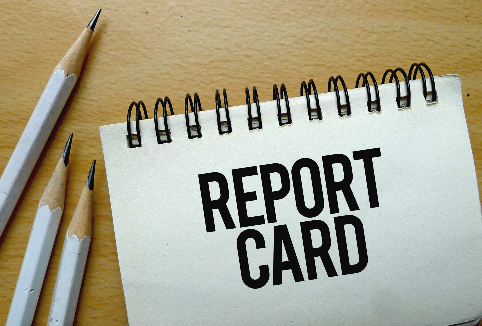 Report card written on a notebook