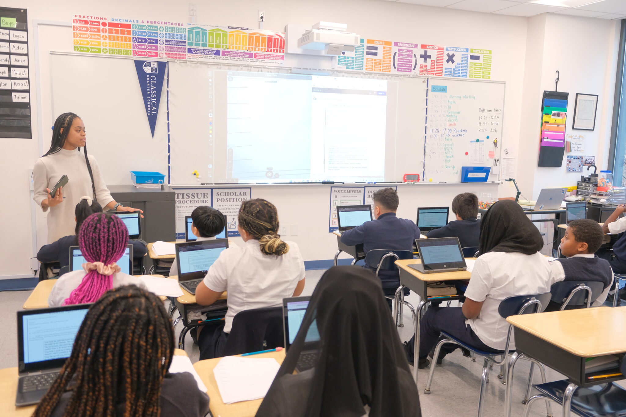 Scholars using laptops during classroom instruction