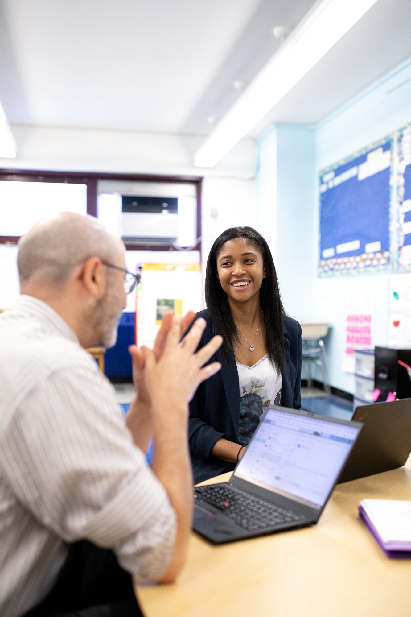 Instructional coach meeting with a teacher