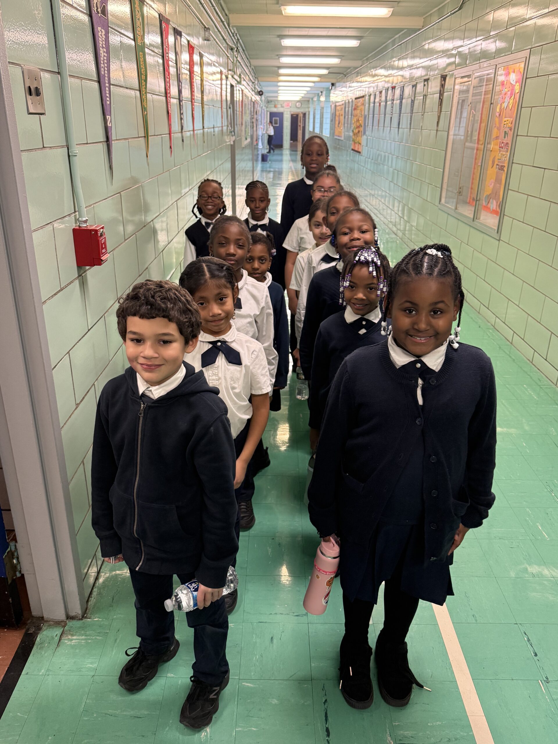 Scholars lined up during a school hallway transition